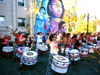 "A Survivor's Journey" inaugural event: the all-female percussion group Batala plays for the crowd.