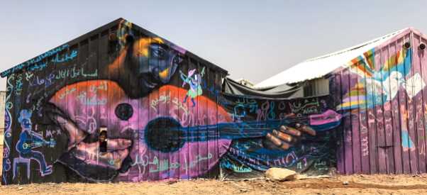 Azraq Syrian Refugee Camp, Jordan 2017: Playing music from the darkness: mural in Azraq Camp.