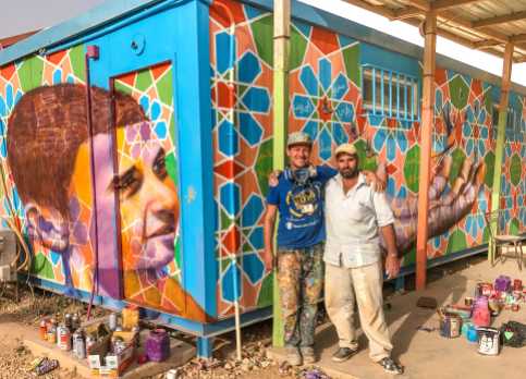 Za'atari Syrian Refugee Camp, Jordan, 2017: Joel with Ali, Syrian artist in Za'atari who creates amazing Arabesque patterns.