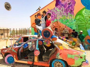 Turning this broken-down car into a work of art in Za'atari Camp